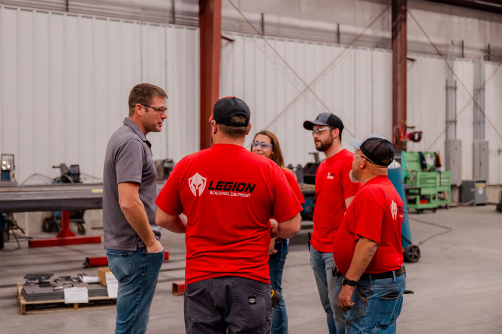 A photo of conversing employees